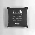 Decorative pillow with a typographic design featuring the phrase "This is Why We Can't Have Nice Things" and cat illustrations.