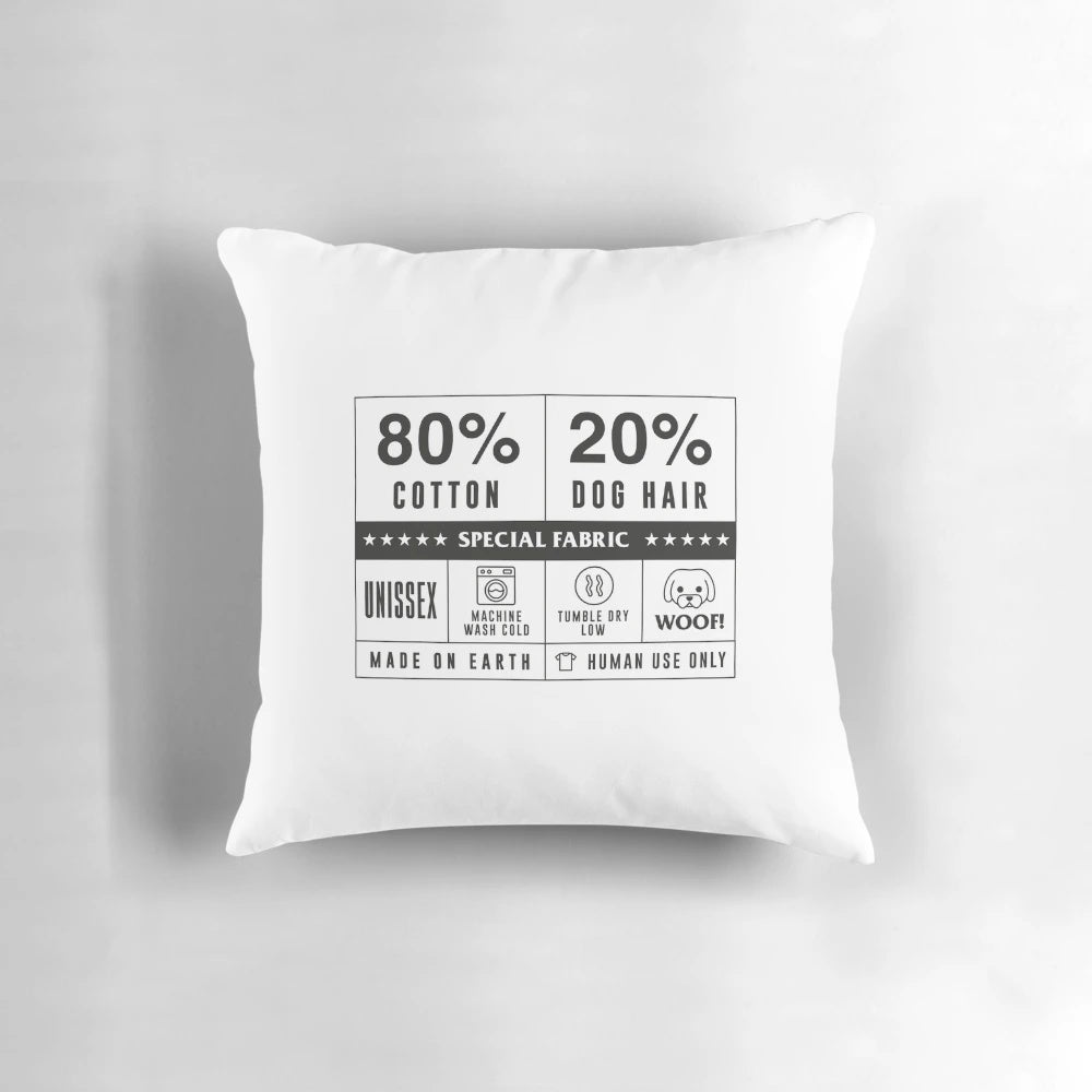 A cozy cotton pillow with a humorous dog hair design, perfect for dog owners.