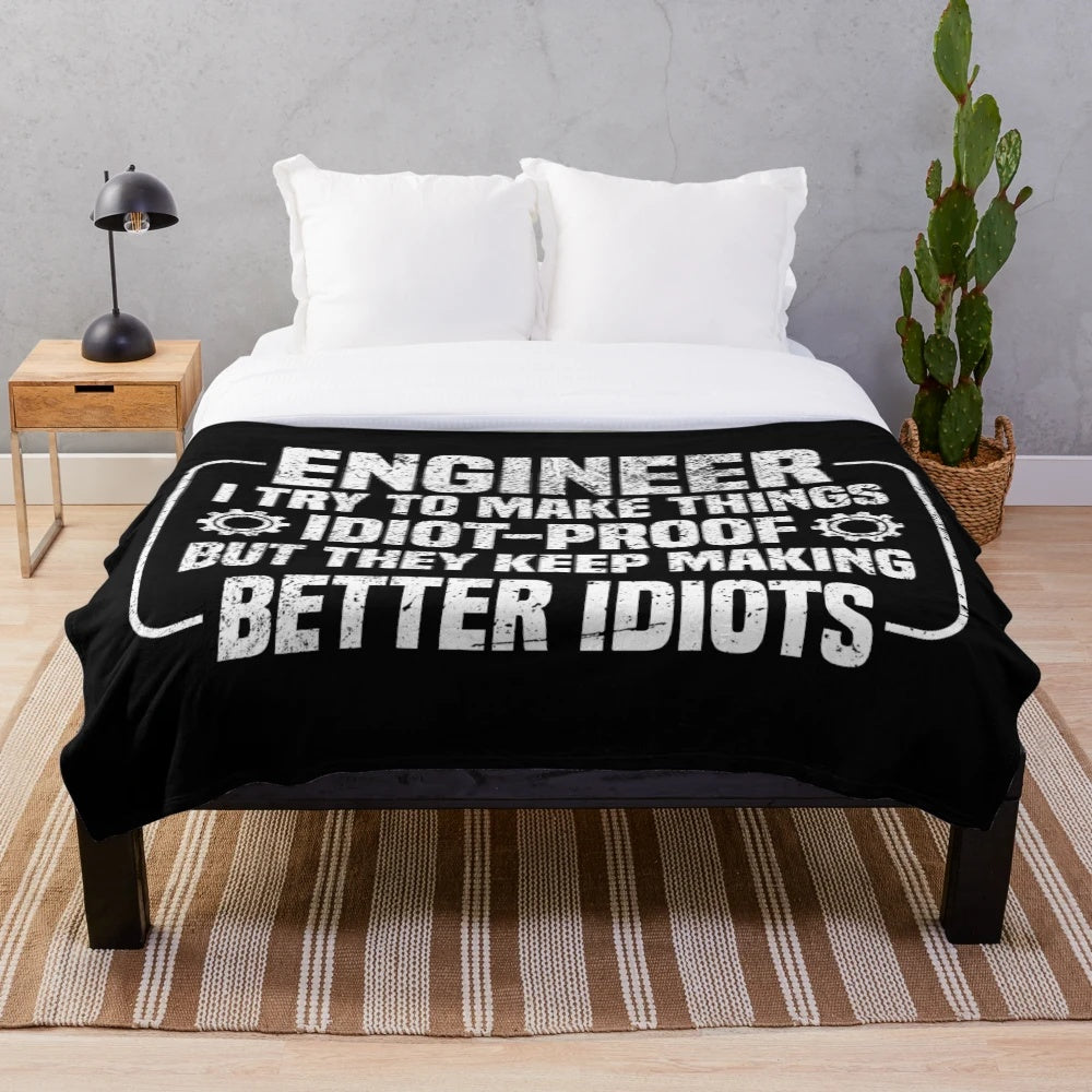 Funny engineer plush blanket with the text "I Try To Make Things Idiot Proof But They Keep Making Better Idiots