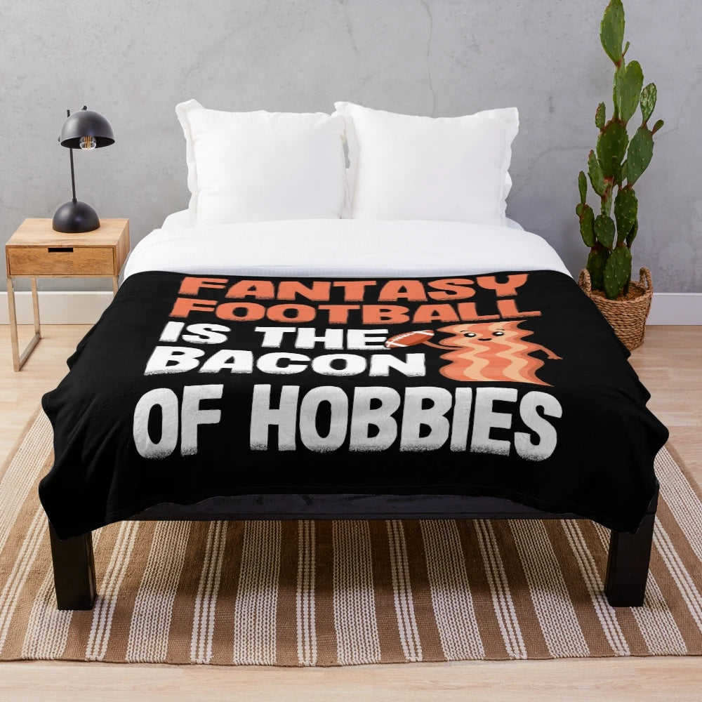 Cozy plush blanket featuring a humorous "Fantasy Football is the Bacon of Hobbies" design