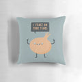 Funny pillow with cartoon onion character and text "I feast on your tears!