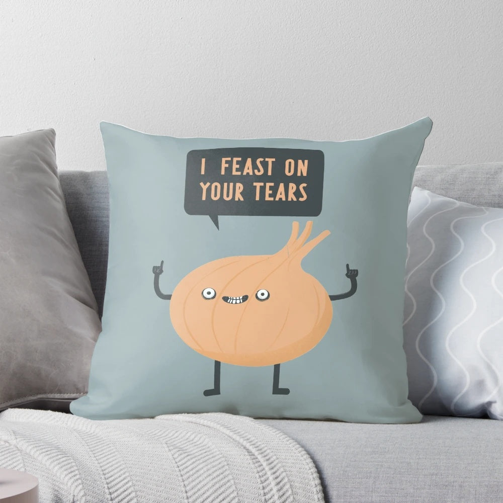 Funny pillow with cartoon onion character and text "I feast on your tears!
