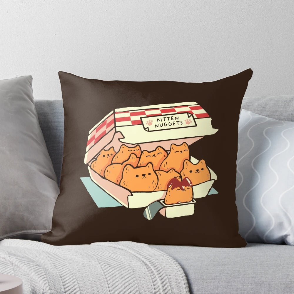 Whimsical pillow depicting a cat made of fast food nuggets, designed by artist Tobe Fonseca
