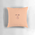 Funny and quirky Nicolas Cage face printed on a small, decorative throw pillow