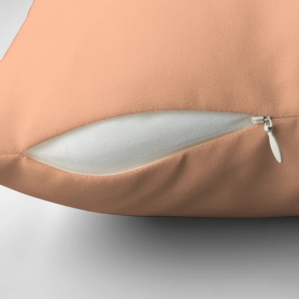 Funny and quirky Nicolas Cage face printed on a small, decorative throw pillow