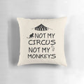 Colorful decorative pillow with the text "Not My Circus, Not My Monkeys" printed on it