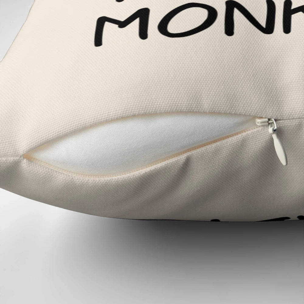 Colorful decorative pillow with the text "Not My Circus, Not My Monkeys" printed on it