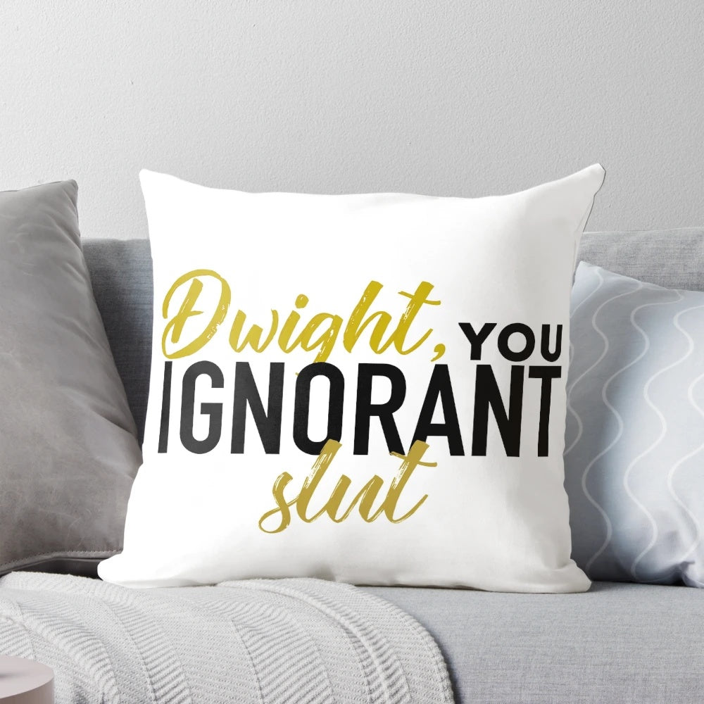 "Dwight, You Ignorant Slut" decorative office pillow featuring a humorous quote from the TV show The Office
