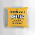 Light color pillow with a funny programming joke - "Being a programmer is easy. It's like riding a bike.