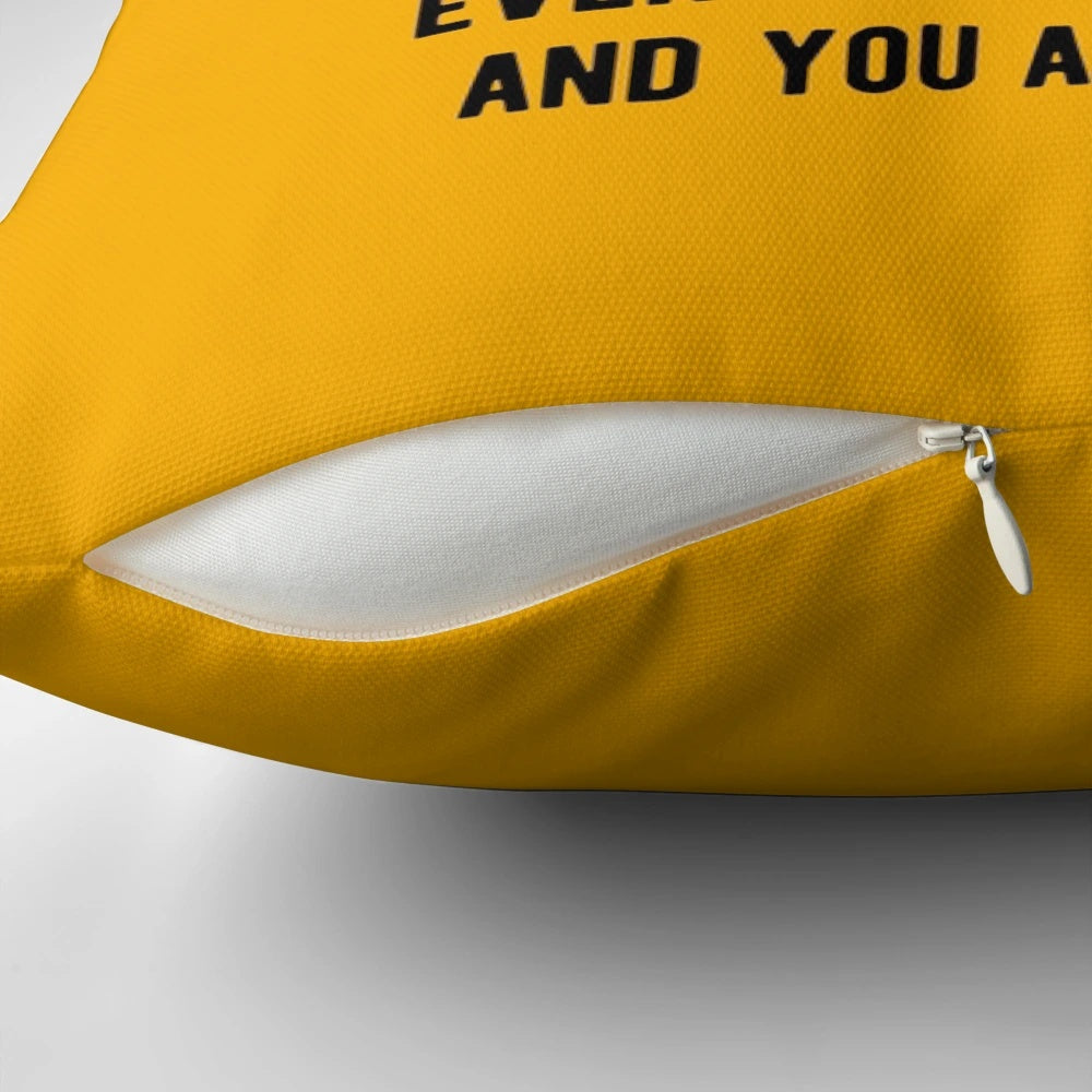Light color pillow with a funny programming joke - "Being a programmer is easy. It's like riding a bike.
