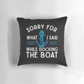 A white pillow with the text "Sorry for what I said while docking the boat" printed on it, a humorous gift for boating and sailing enthusiasts.