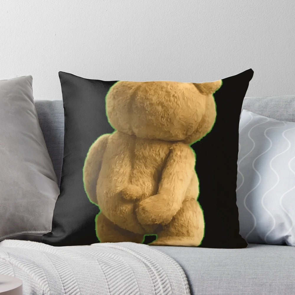 Soft, plush teddy bear pillow with a humorous design of the character "Ted" scratching his backside.