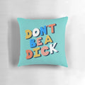 Funny typography pillow with the text "Don't Be A Dick" in a bold, stylized font