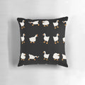 A soft, plush pillow featuring a cute and funny illustration of a duck and goose with knives, inspired by the popular video game Untitled Goose Game.