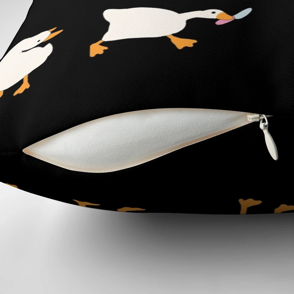 A soft, plush pillow featuring a cute and funny illustration of a duck and goose with knives, inspired by the popular video game Untitled Goose Game.