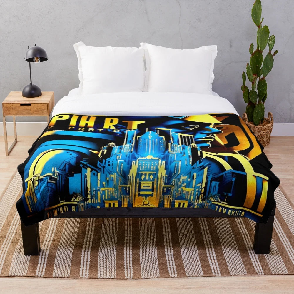 Futuristic cinema-themed plush blanket with color block design in blue, black, yellow, and orange