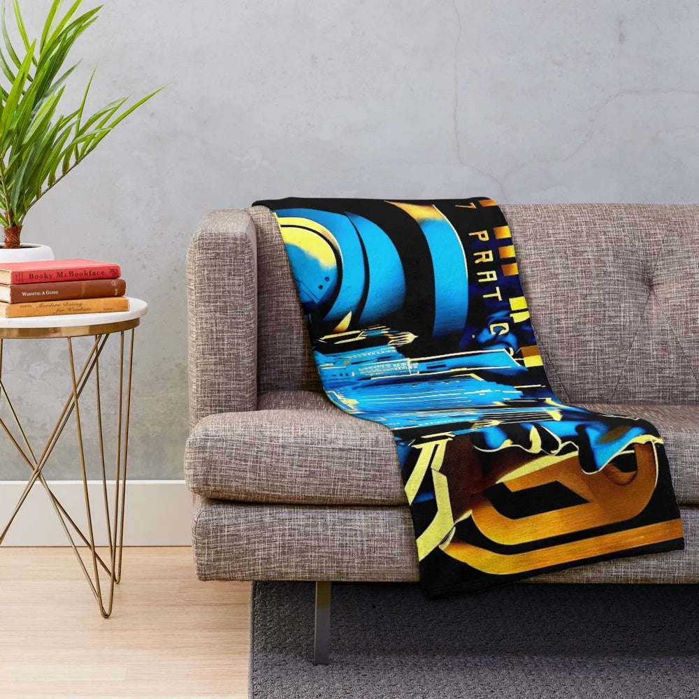 Futuristic cinema-themed plush blanket with color block design in blue, black, yellow, and orange