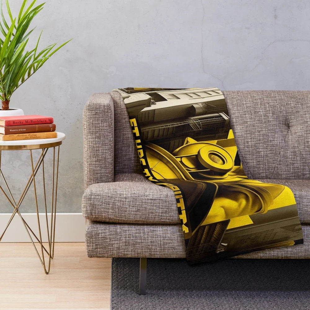 Futuristic graphic print plush blanket with movie theater and city skyline design