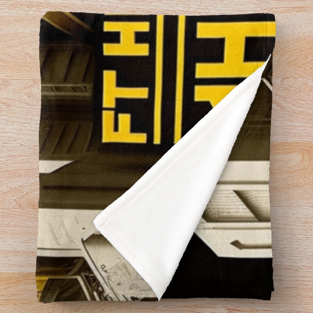 Futuristic graphic print plush blanket with movie theater and city skyline design