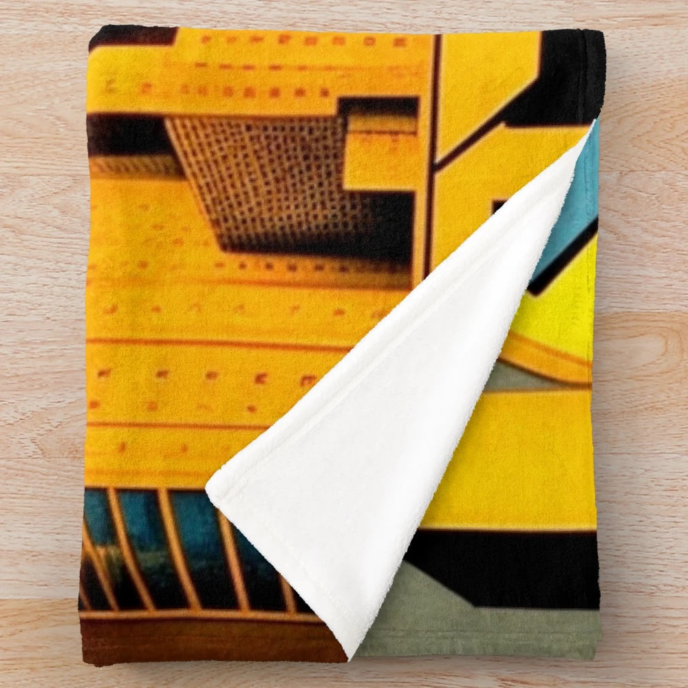 Metropolis-inspired plush blanket with futuristic cinema, lights, and game graphics