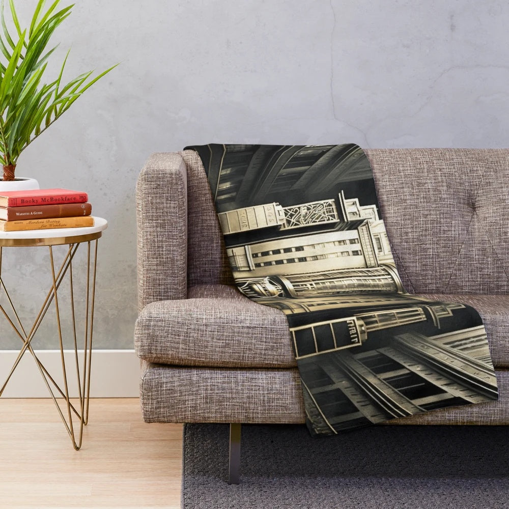 Futuristic cityscape plush blanket with cinema and light game elements