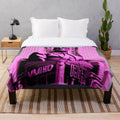 Futuristic cityscape plush blanket with art deco cinema and movie theater design