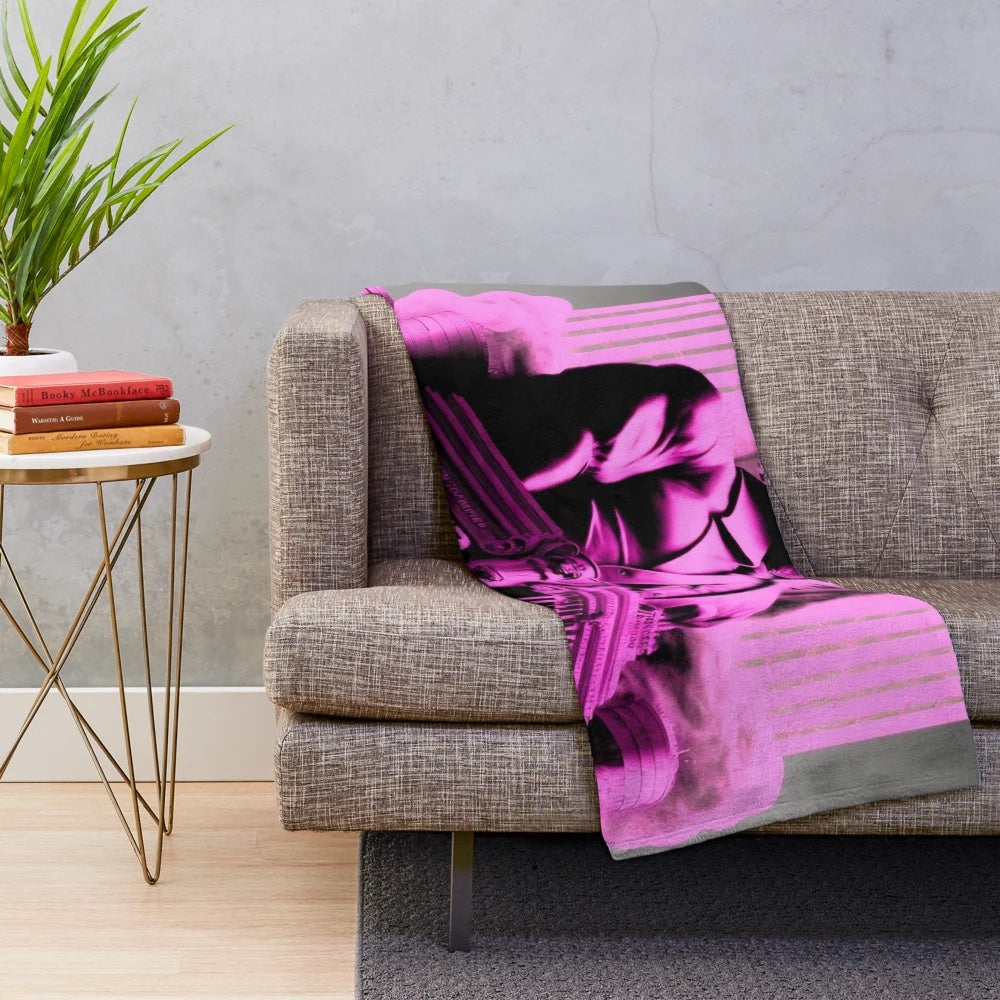 Futuristic cityscape plush blanket with art deco cinema and movie theater design