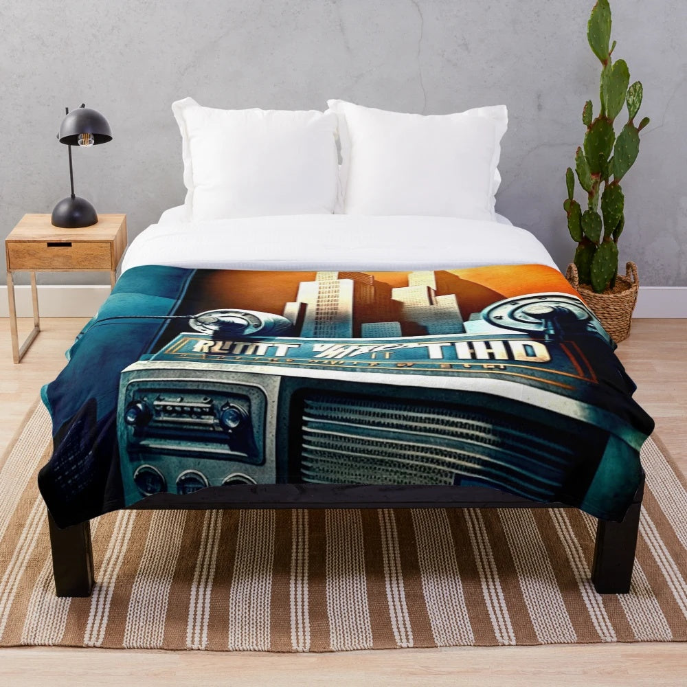 Plush blanket featuring a futuristic, metropolitan cityscape in a color palette of black, blue, white, yellow, and orange