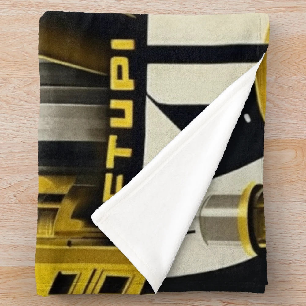 Plush blanket with futuristic movie-inspired cinema lighting and art in yellow, black, and gold colors