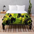 Futuristic city plush blanket with geometric movie theater design in green, black, and yellow