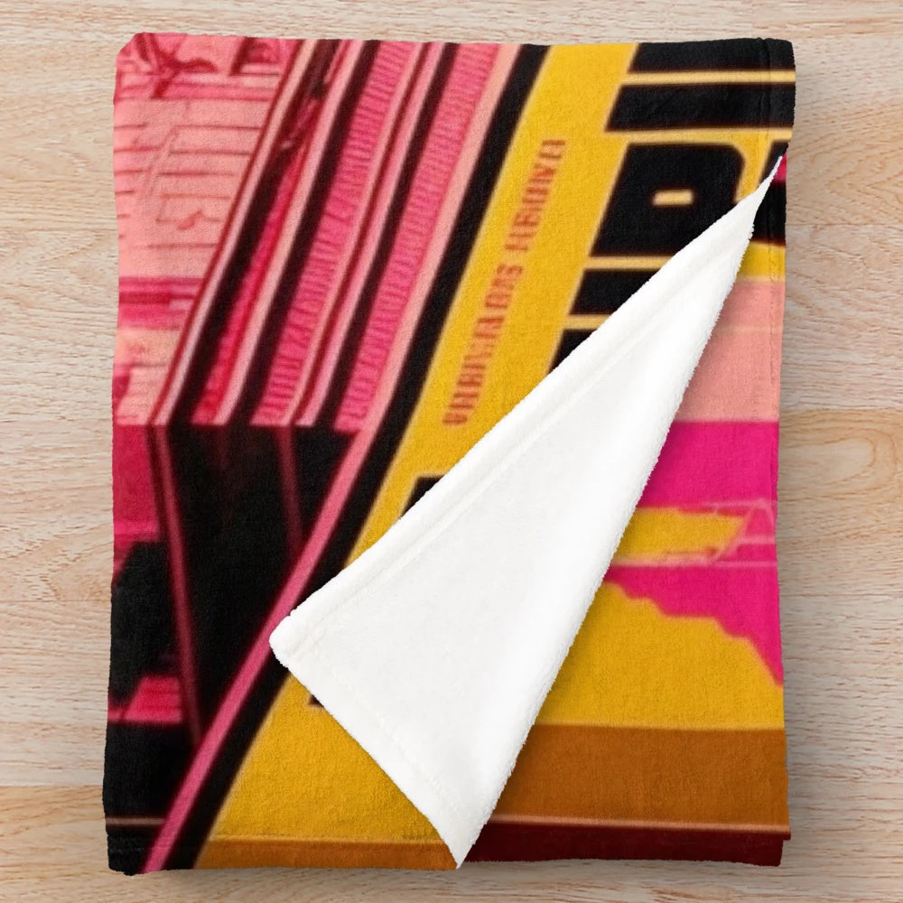 Futuristic plush blanket with geometric, retro-inspired cinema and city-inspired motifs