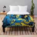 Futuristic sci-fi cinema inspired plush blanket with blue, black, and yellow colors