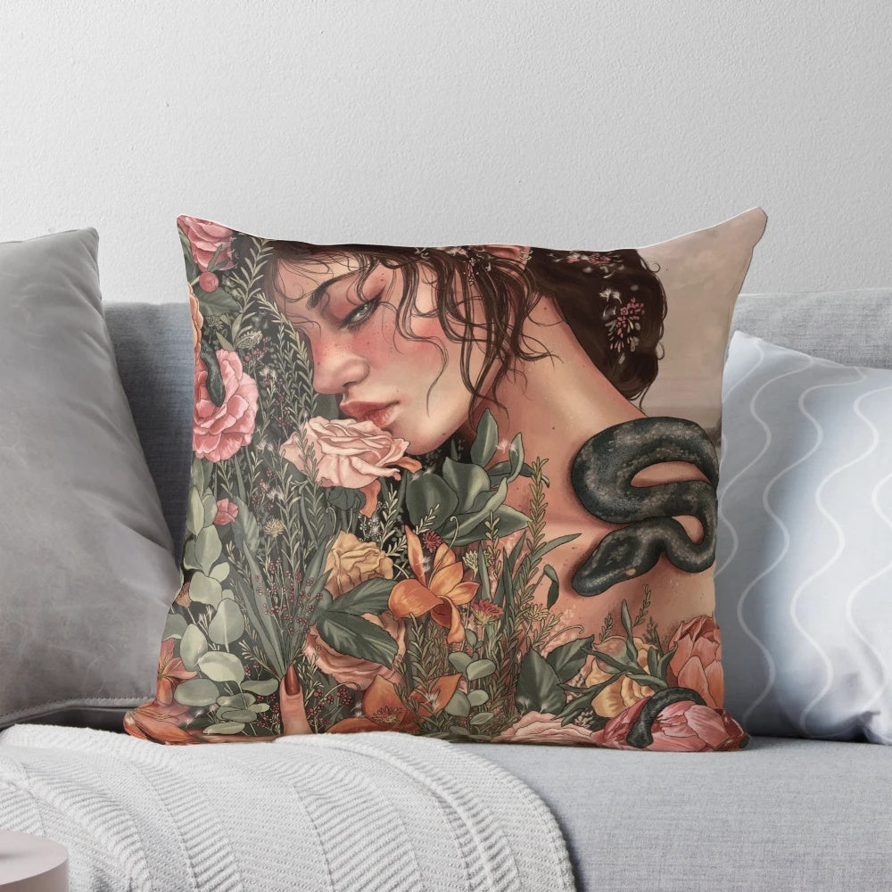 Gaia pillow featuring a nature-inspired design with floral and serpent motifs