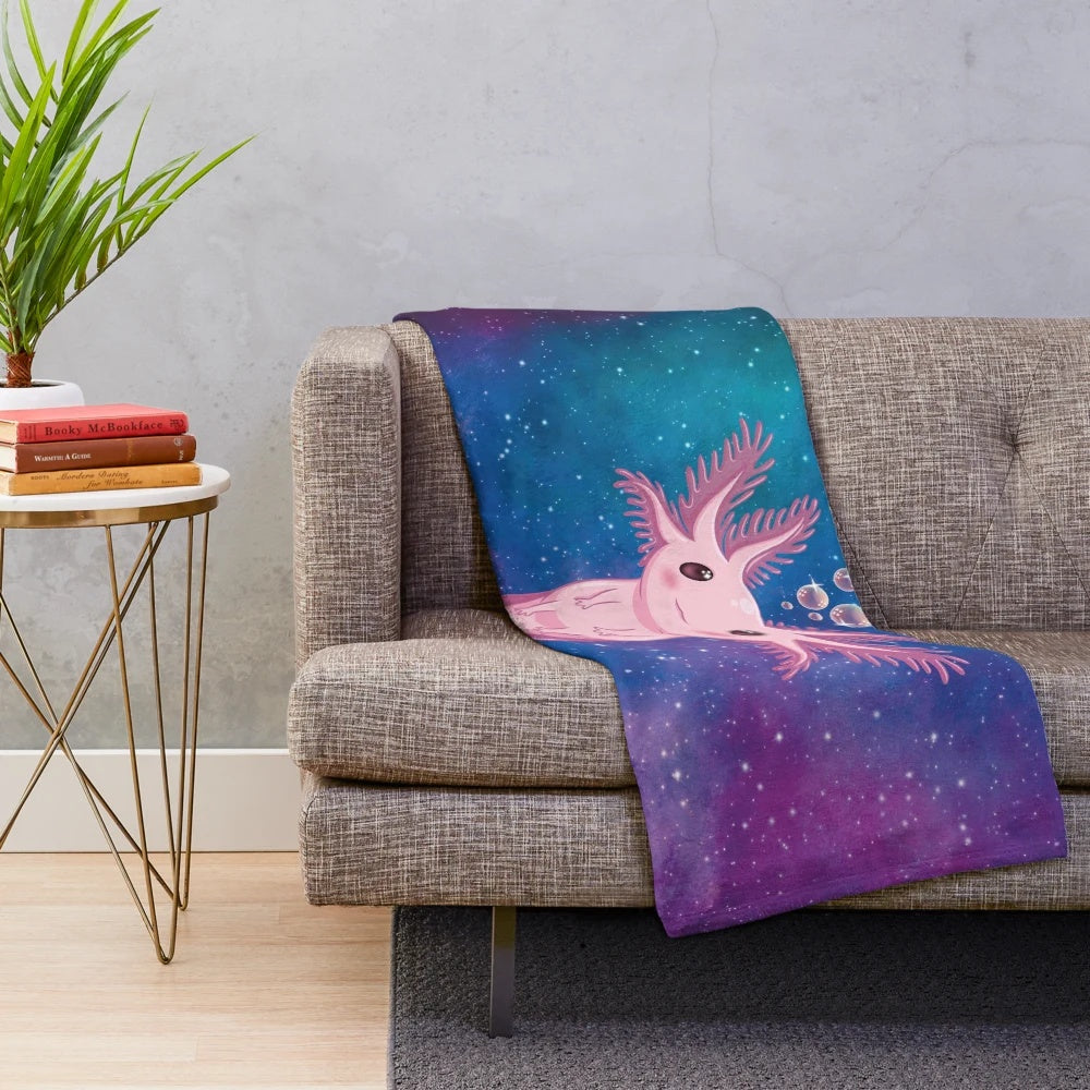 Galactic axolotl plush blanket with cosmic comet and sparkle design