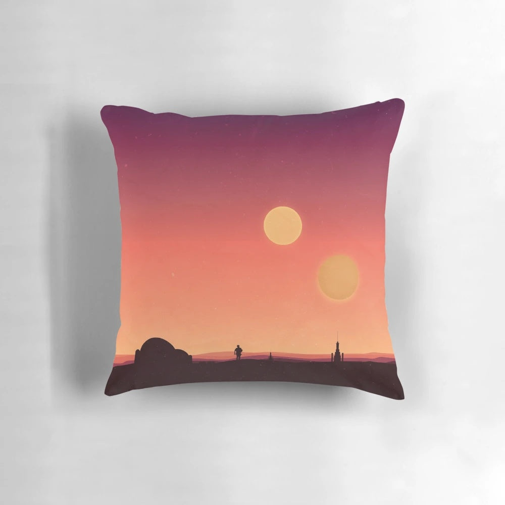 A decorative throw pillow featuring a gradient design with dual suns, inspired by the desert planet Tatooine from the Star Wars universe.