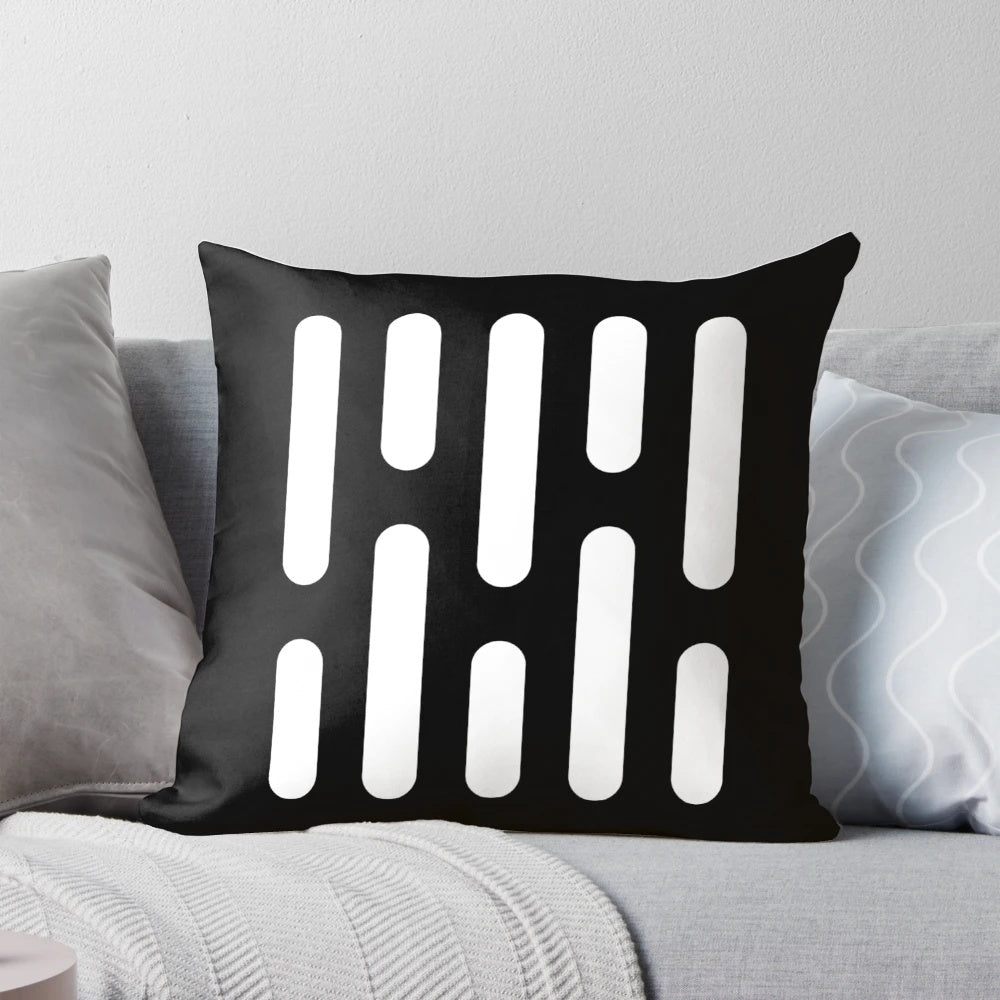 A decorative throw pillow featuring the iconic Death Star from the Star Wars franchise.