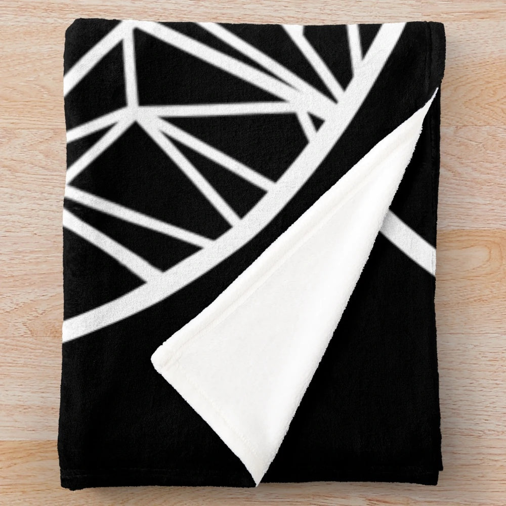 Plush blanket featuring a white outline design of mountains and stars against a galaxy background
