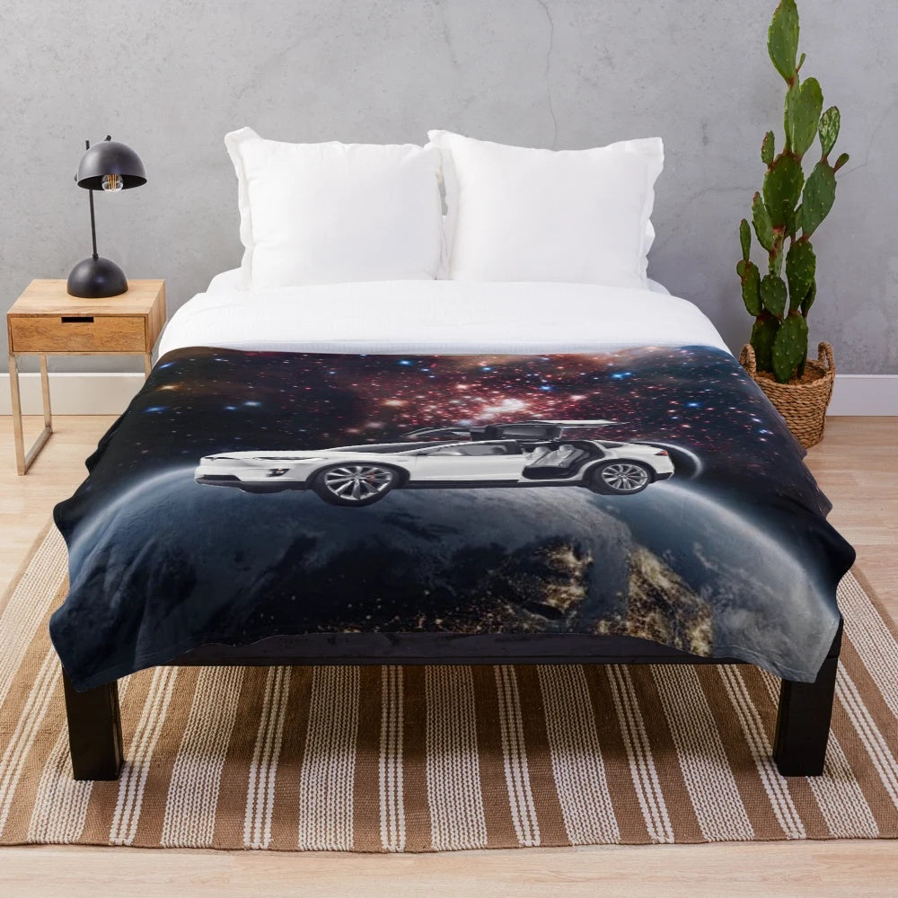 Plush galaxy-themed blanket with Tesla car design