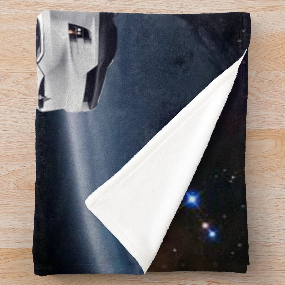 Plush galaxy-themed blanket with Tesla car design