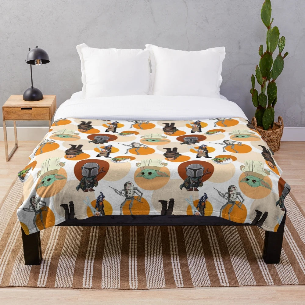 Star Wars-themed plush blanket with galactic patterns and Mandalorian design