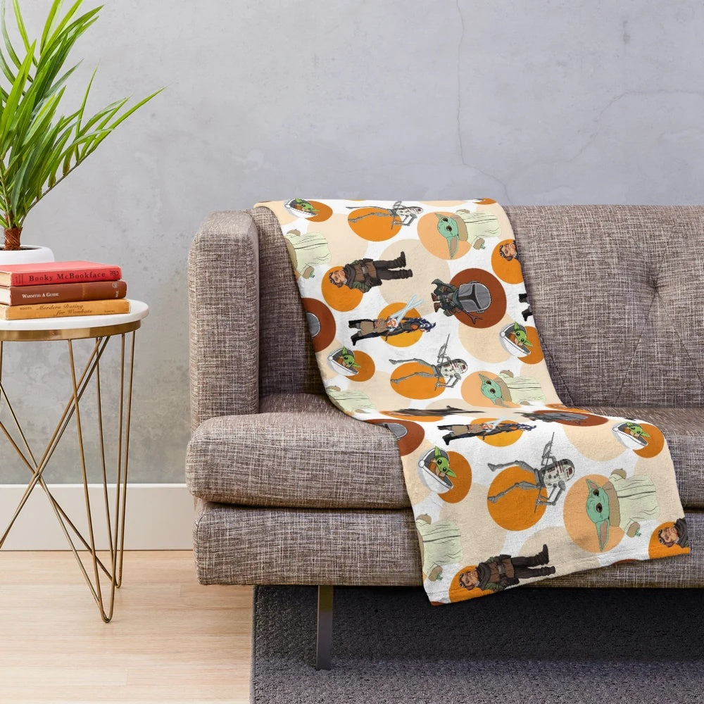 Star Wars-themed plush blanket with galactic patterns and Mandalorian design