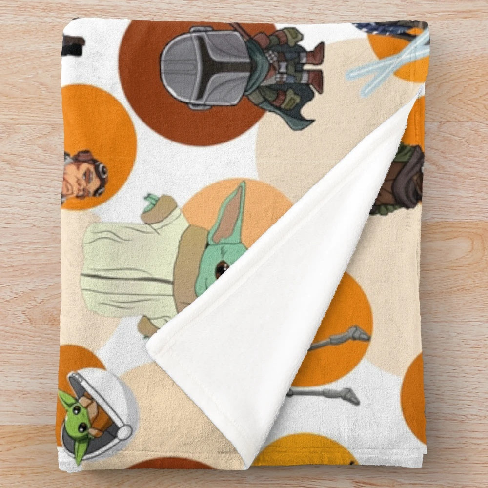 Star Wars-themed plush blanket with galactic patterns and Mandalorian design