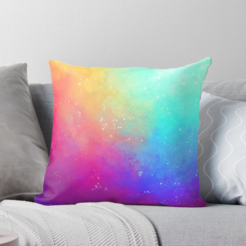 Colorful galaxy-themed pillow with a spray paint sky design