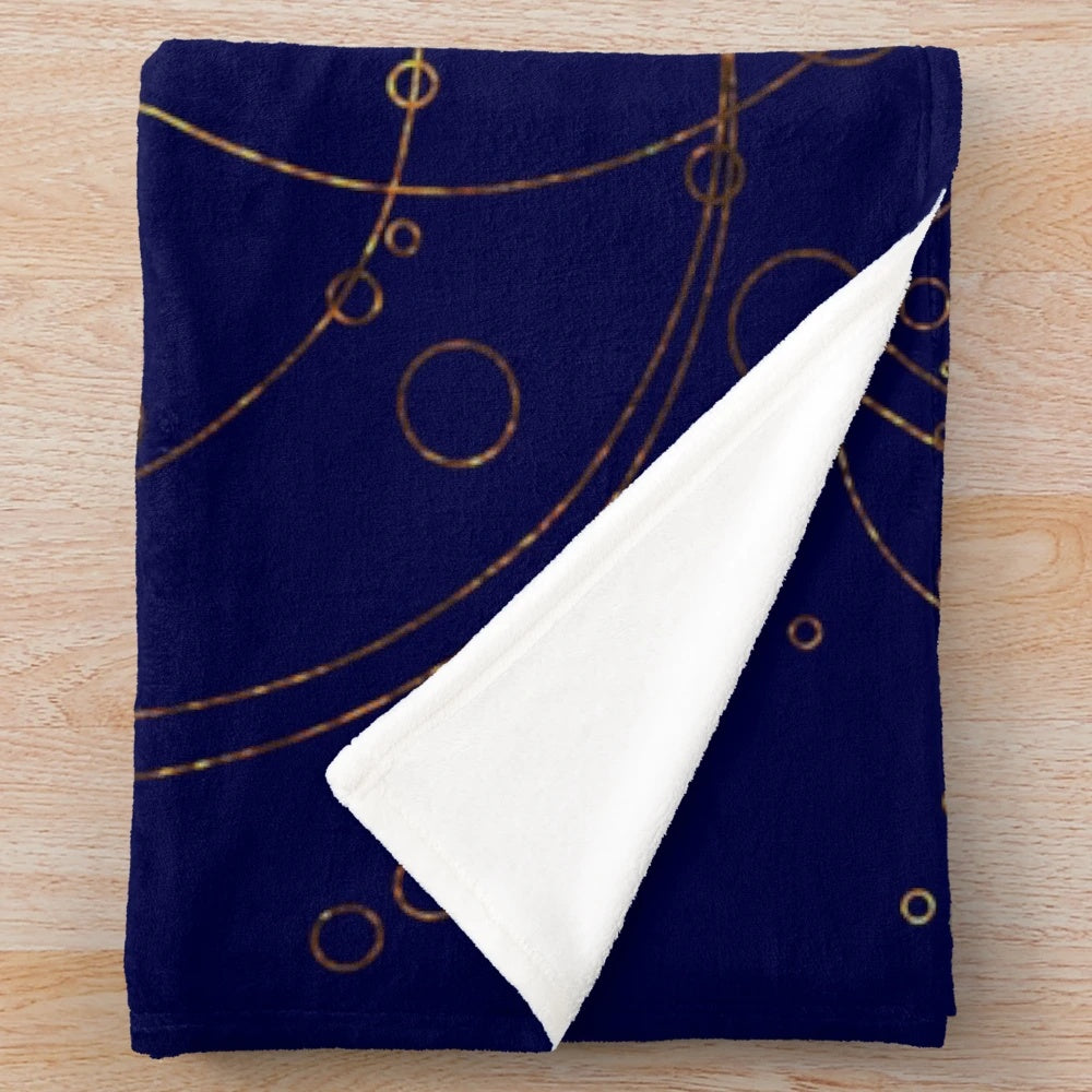 Transparent and glittery plush blanket with a time lord, tardis, and gallifreyan inspired pattern