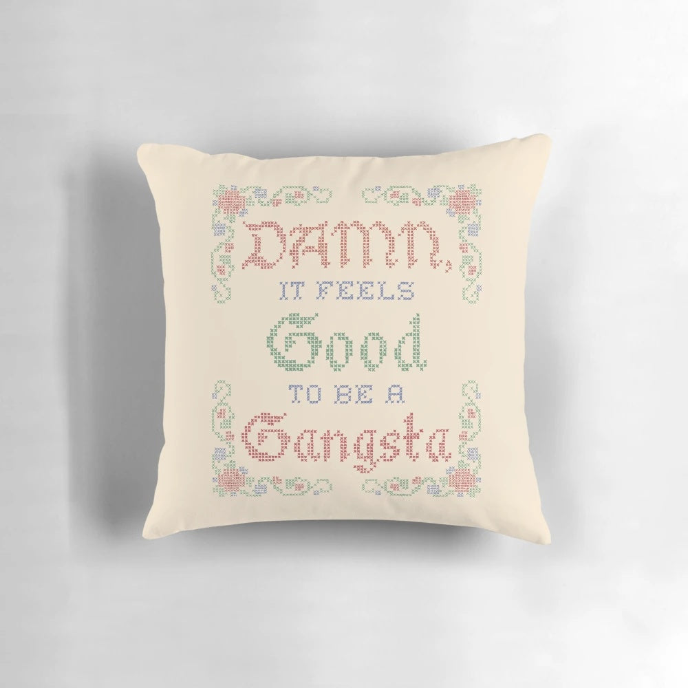 Pillow featuring the iconic 'Damn It Feels Good to Be a Gangsta' lyrics from the movie Office Space