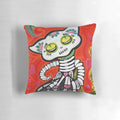 Decorative Gato De Los Muertos pillow featuring a whimsical cat skeleton design for Day of the Dead celebrations.