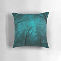 Pillow featuring a design of a starry night sky with silhouetted tree branches