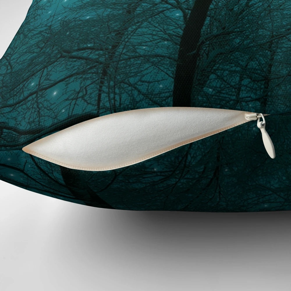 Pillow featuring a design of a starry night sky with silhouetted tree branches