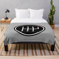 Plush blanket featuring a red manual transmission logo