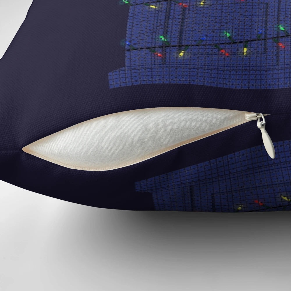 A cozy knitted pillow featuring the iconic Doctor Who police box design, perfect for festive sci-fi fans.